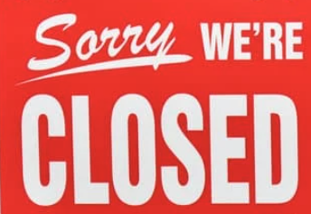Sign saying, "Sorry, We're Closed"
